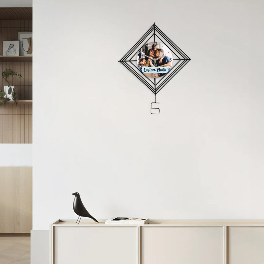 Decorative wall clock with pendulum made of wire